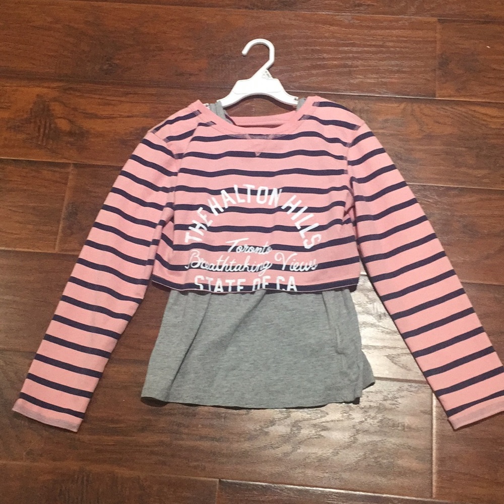Pink crop top and gray tank top